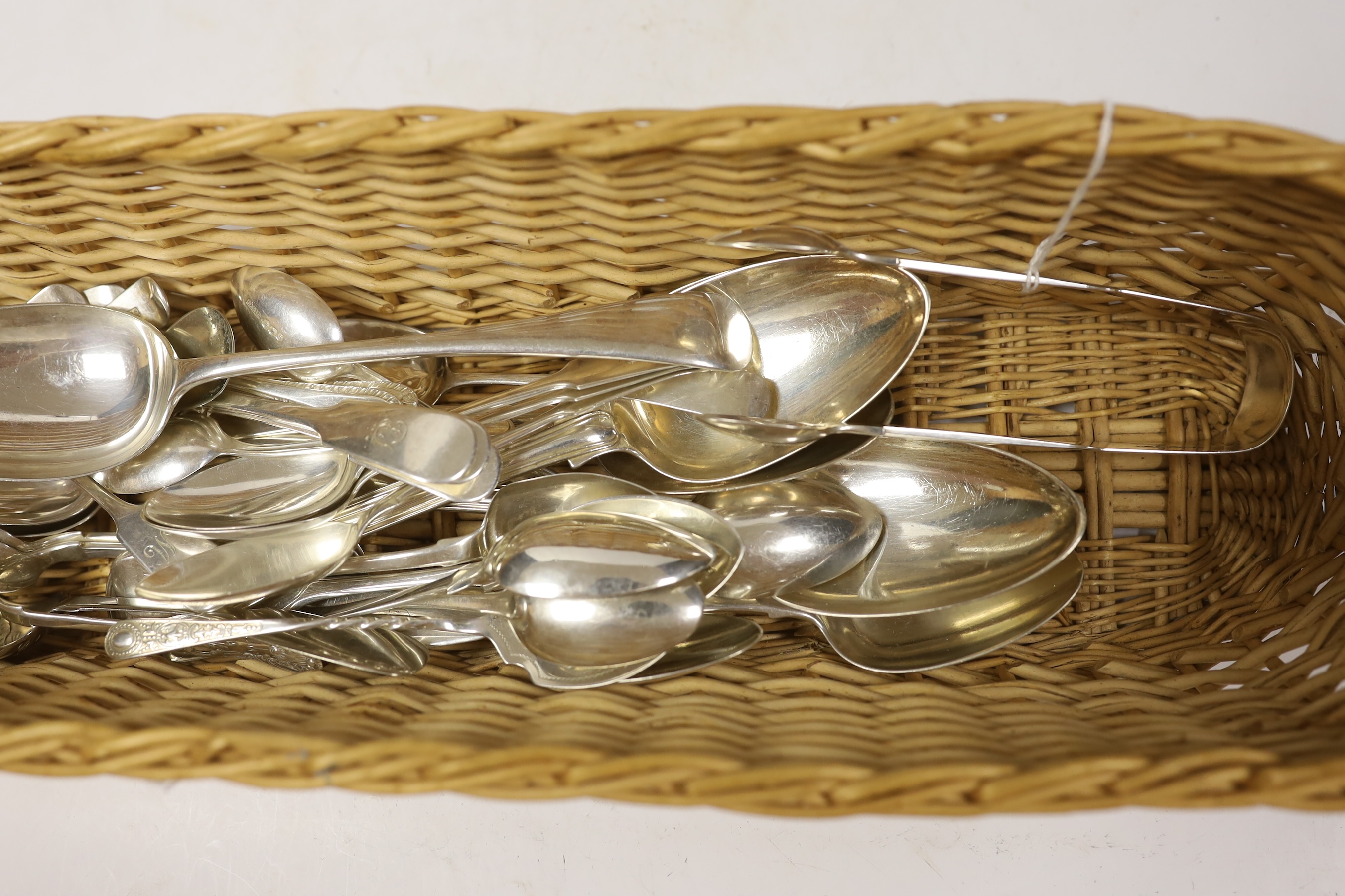 Assorted silver flatware including a set of six Victorian fiddle pattern teaspoons and pair of tongs, Newcastle, 1852, a set of six later coffee spoons, Sheffield, 1935, a set of six George III teaspoons, London, 1811 an
